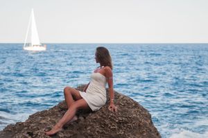 Seaside Portrait – Sailboat on the Horizon
