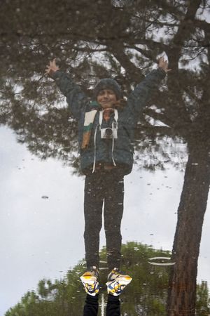 Puddle Reflection – Arms Wide