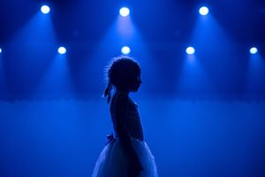 Young Dancer Silhouette – Blue Stage