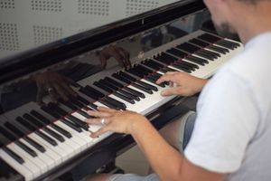 Hands at the Piano – Glossy Reflection