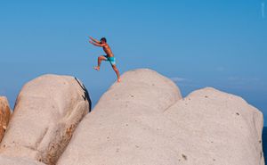 Leap Between Rocks – Blue Sky